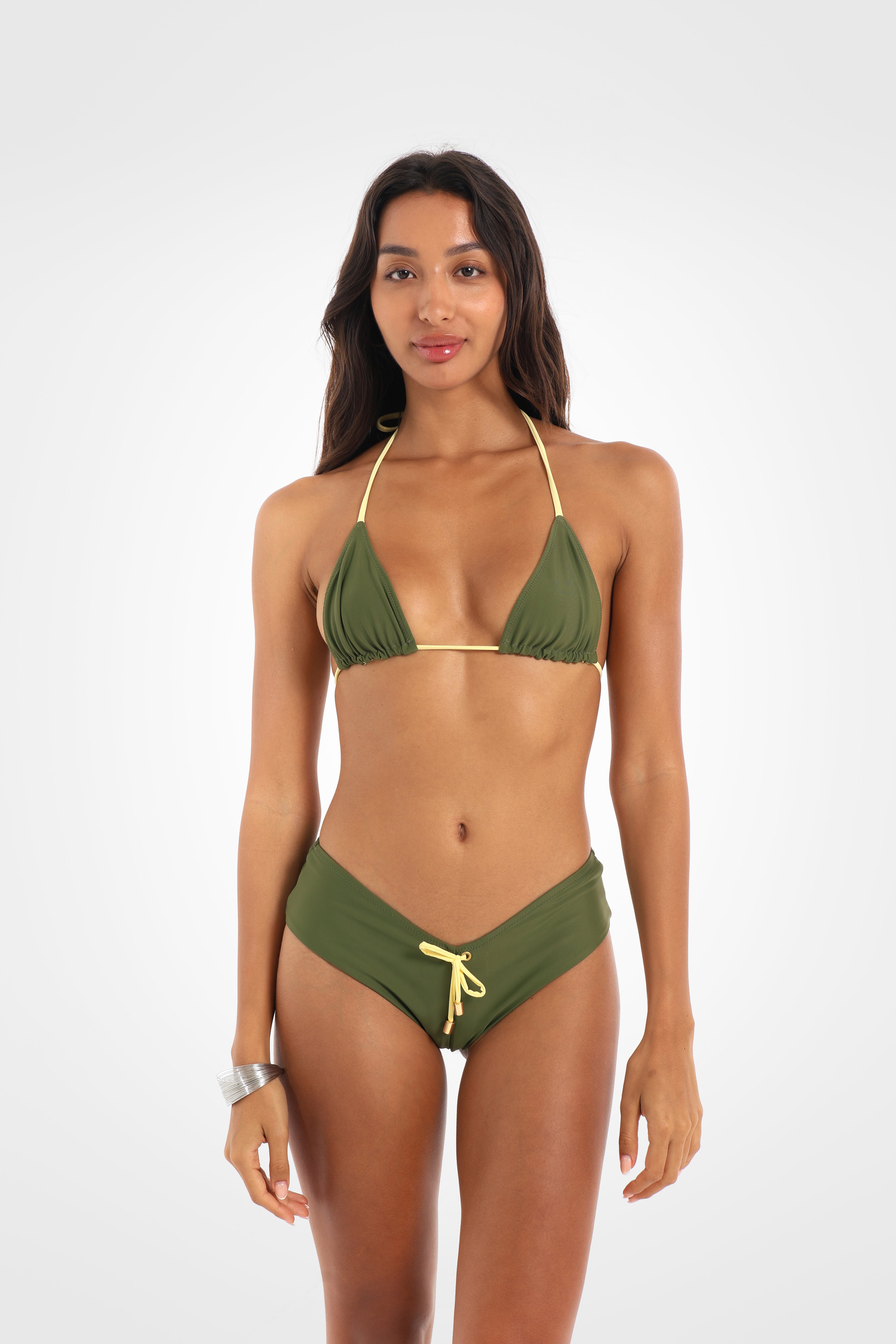 Front view of the Mossii Cheeky Shortie Bikini Bottoms in khaki green featuring a flattering V-front, butter-yellow contrast ties, and a cheeky fit.