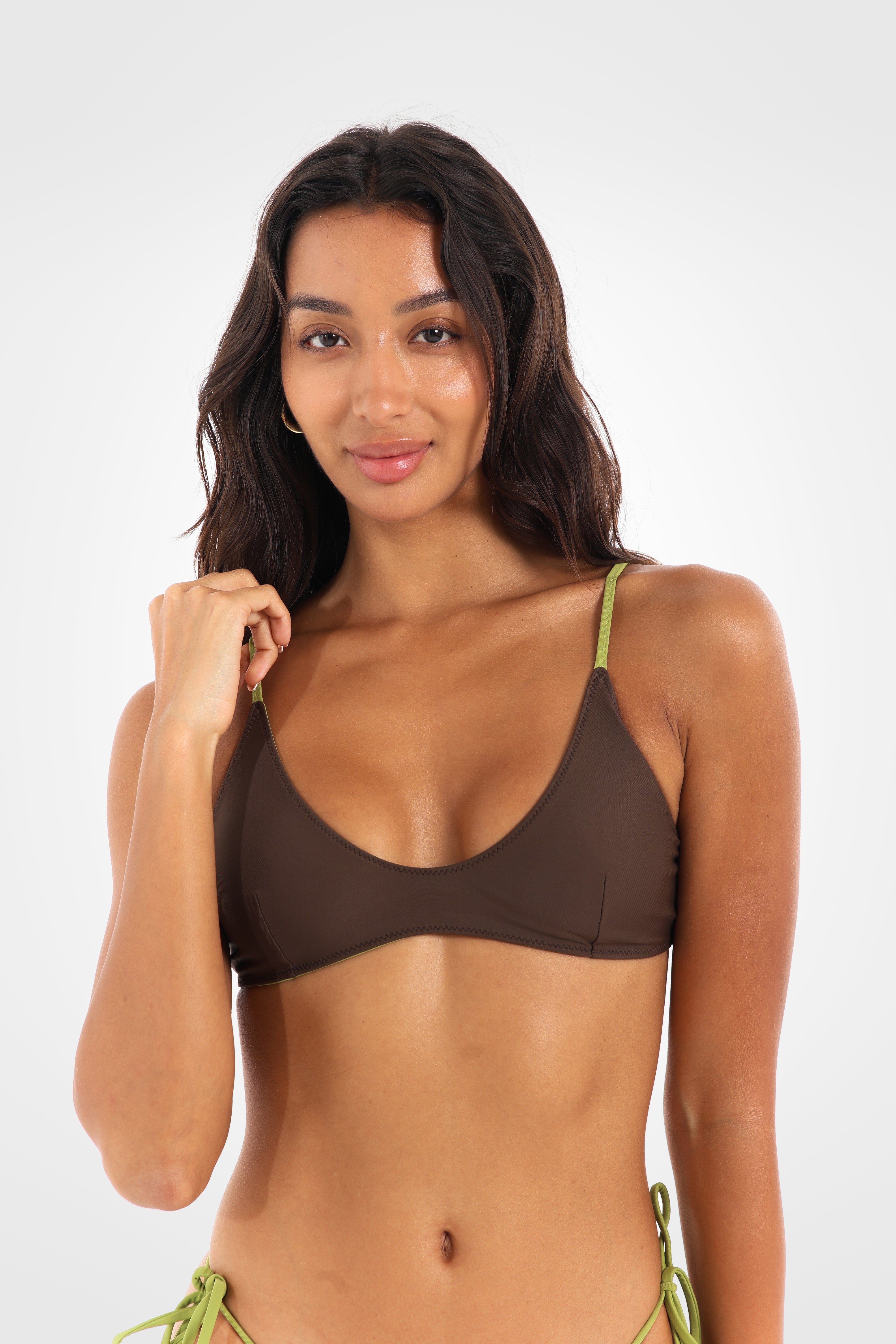 Close-up front view of the Aruna Reversible Scoop Bikini Top in chocolate brown showcasing the scoop neckline and soft, supportive fit.