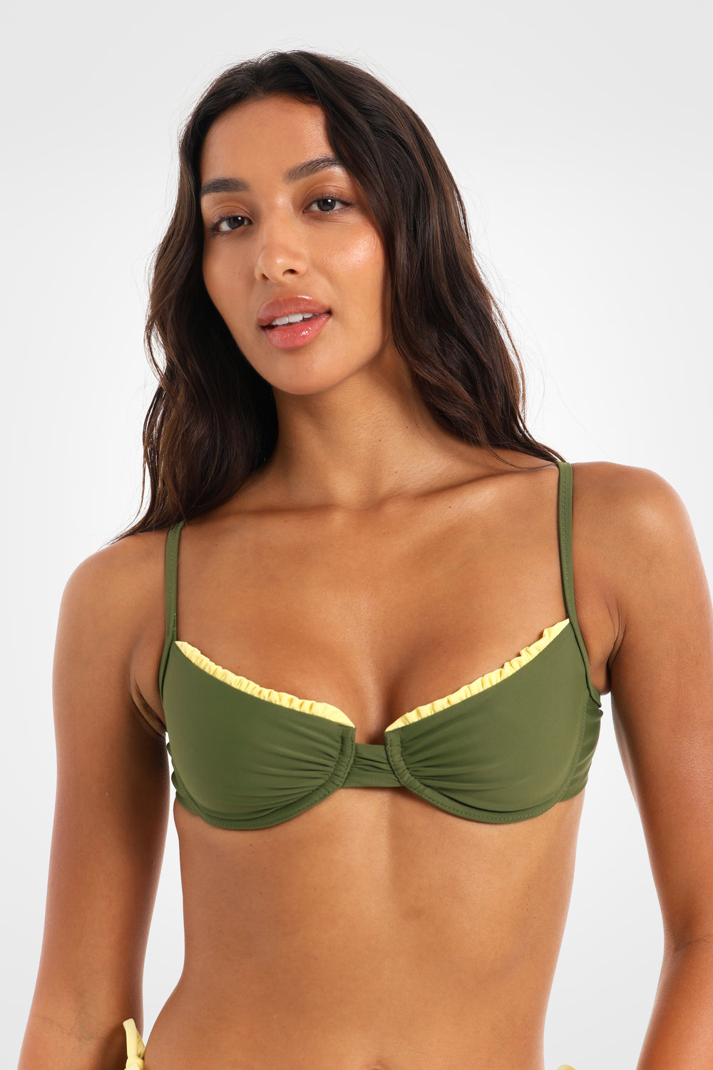 Close-up front view of the Mossii Underwire Bikini Top highlighting the supportive underwire design, butter-yellow ruched edging, and sculpting silhouette.