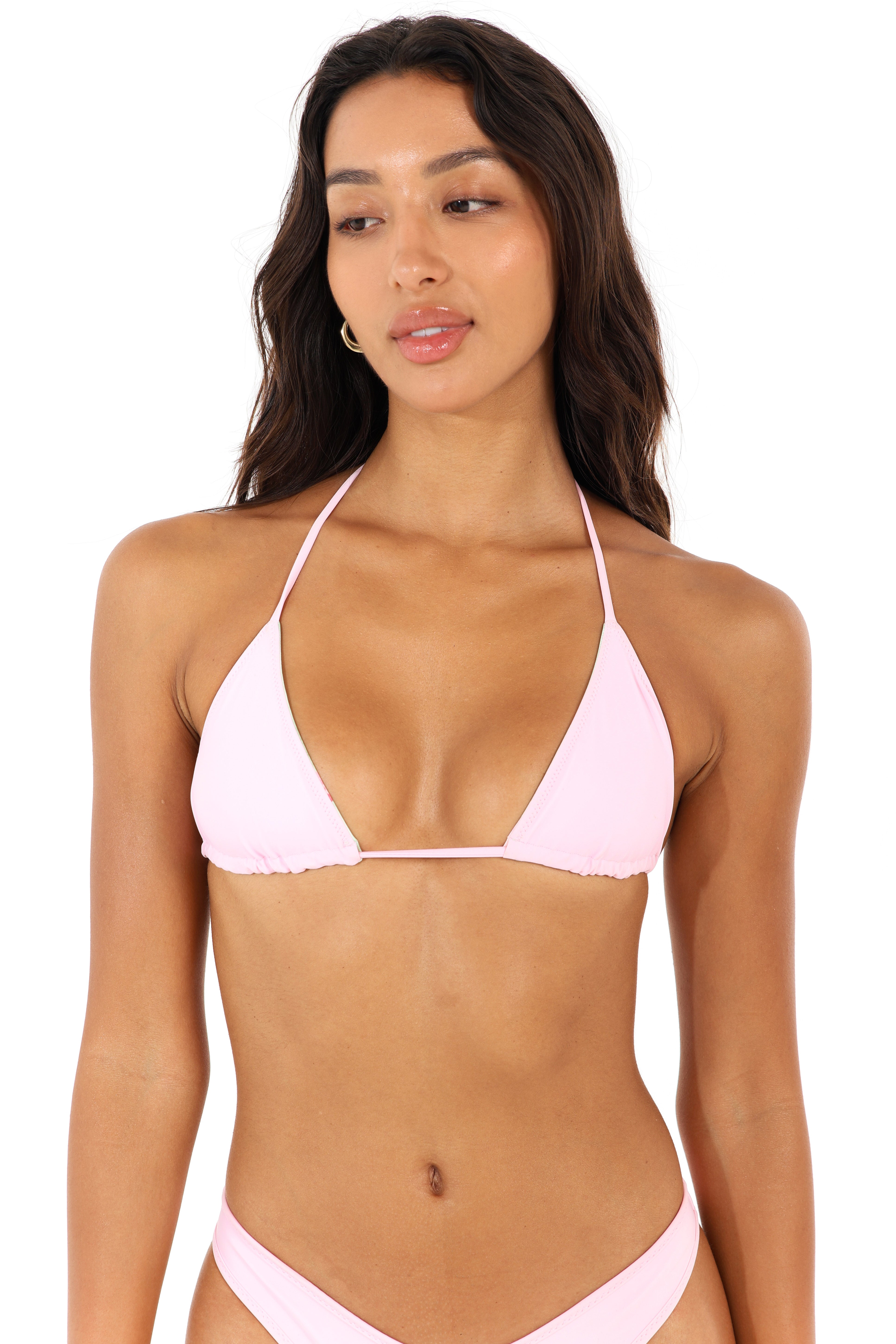 Model wearing pink triangle bikini top – Rays of Earth